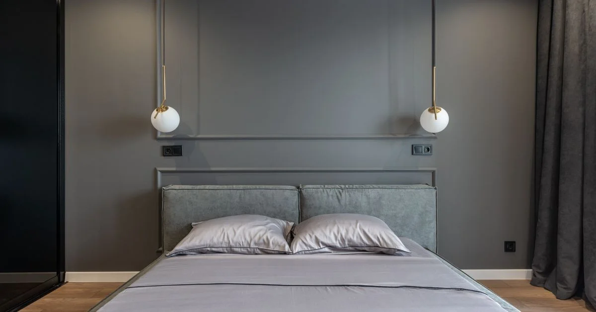 Low-profile upholstered platform bed frame in a modern bedroom, an example of the best budget bed frames for platform beds