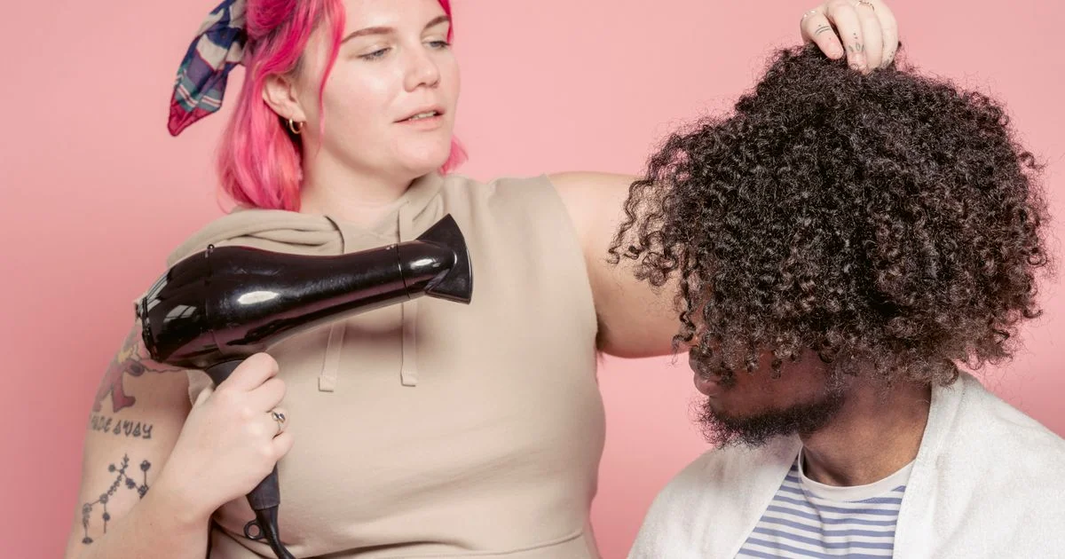 Drying curly hair with a dryer, the job a curly hair dryer with diffuser is built for