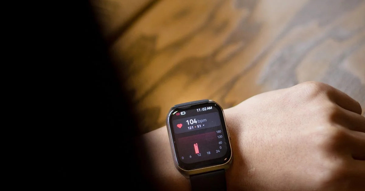 A smartwatch showing a live pulse reading, the free option to weigh when asking is heart rate monitor worth it