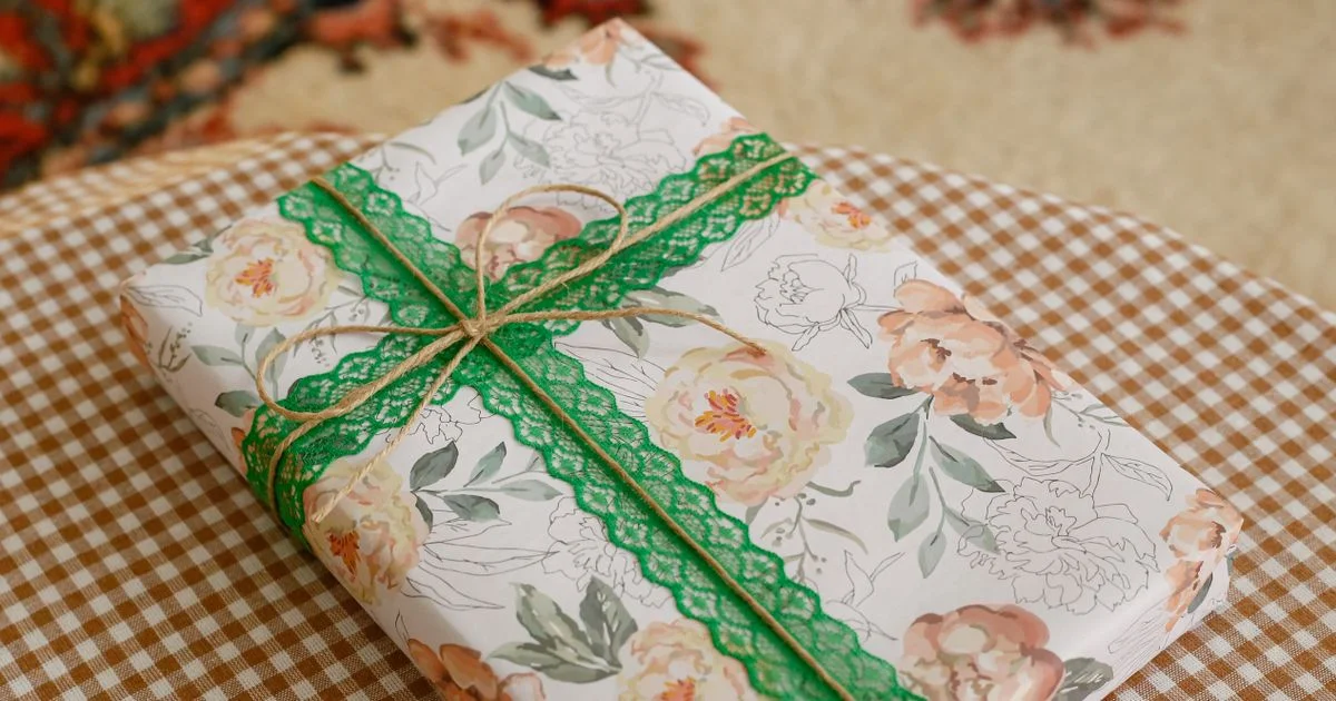 Personalized Gifts Under $50 often look like this hand-wrapped floral gift box tied with lace and twine