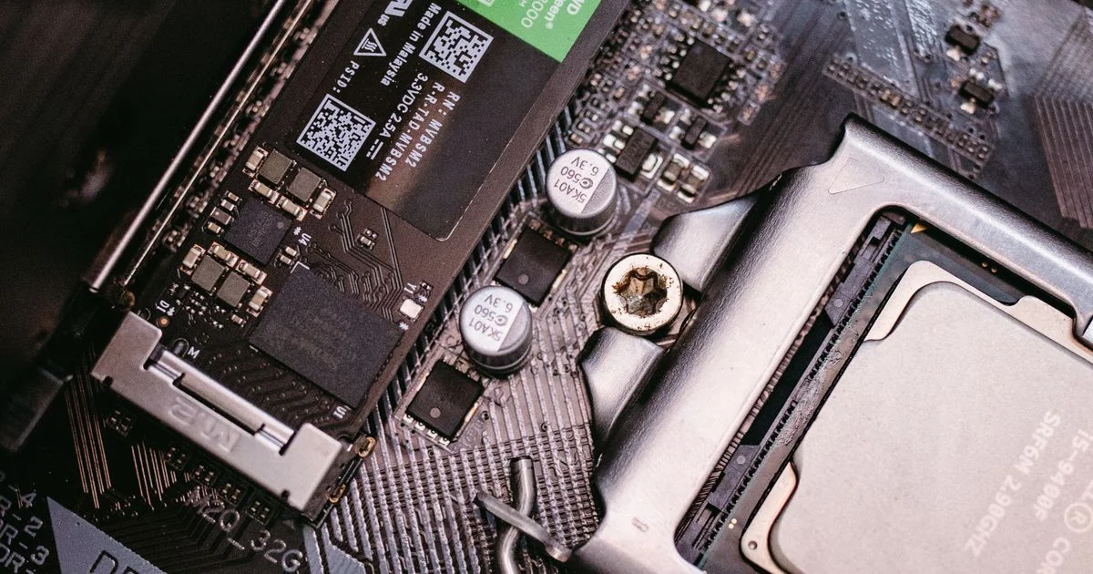 SSD under $60: an M.2 NVMe SSD installed in a motherboard slot beside the CPU socket