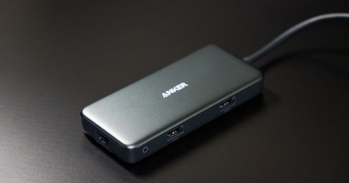 Anker USB-C hub for laptop with visible ports on a dark surface